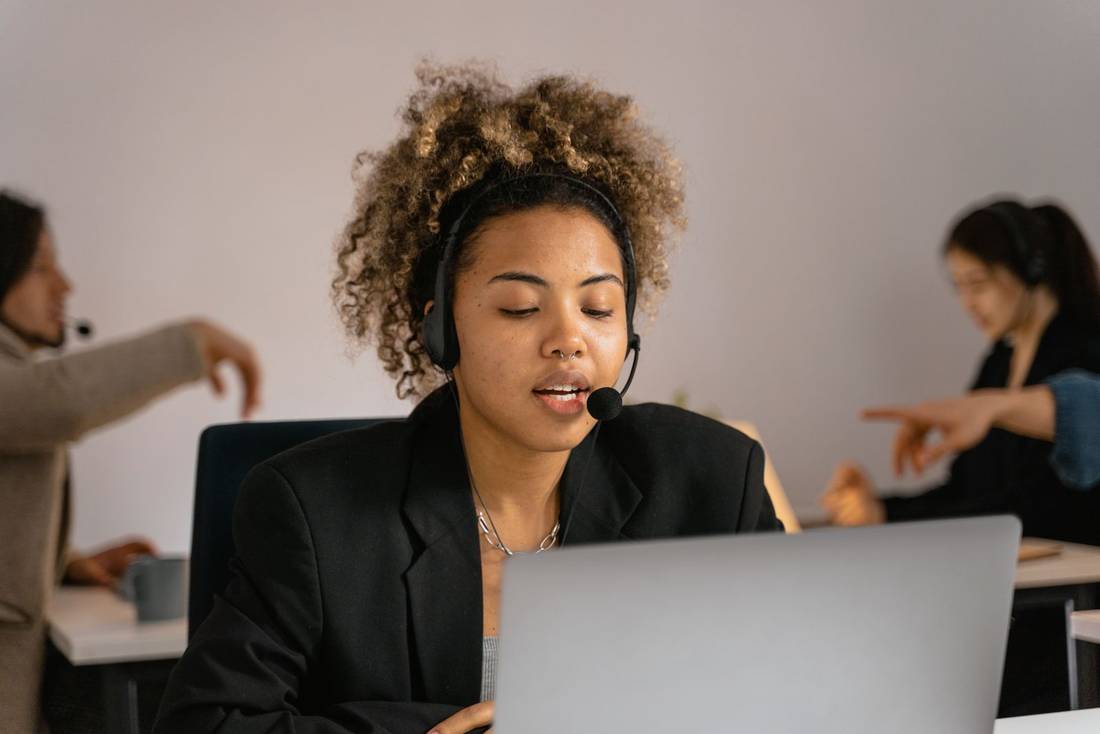 Someone on a headset, working through a support queue